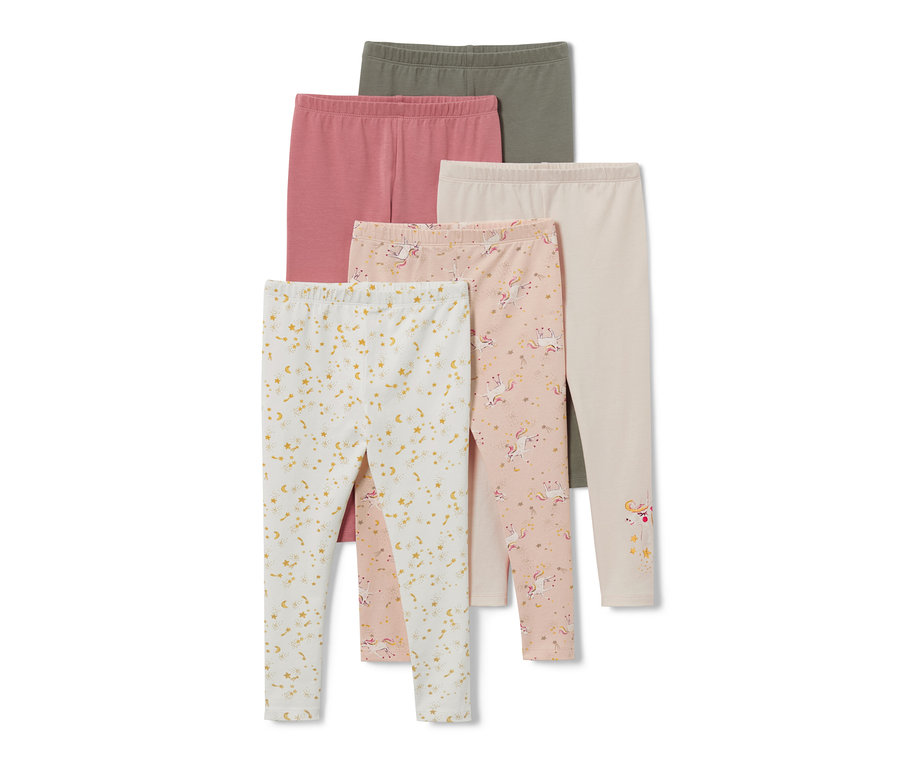 Fünf Kinder-Leggings mit Alloverprint in Oliv, Rosa und Creme sowie mit Einhorn- und Sternenprint.