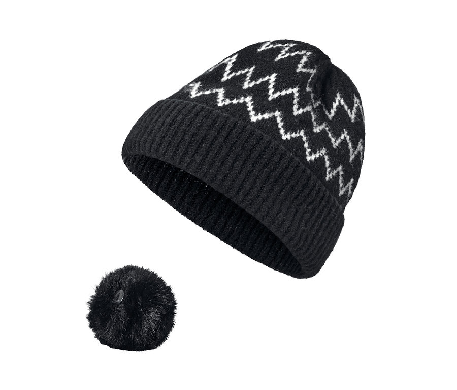 Schwarze Strickmütze mit Zickzackmuster und Bommel.