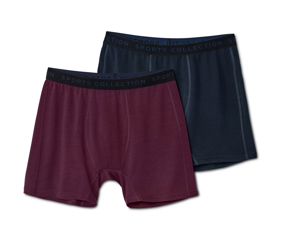Zwei Funktionsslipboxer mit Merinowolle, eine bordeauxrot und eine dunkelblau.