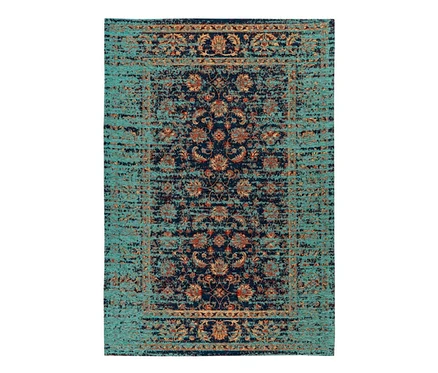 Ein blau-türkis-brauner Teppich mit Blumenmuster.