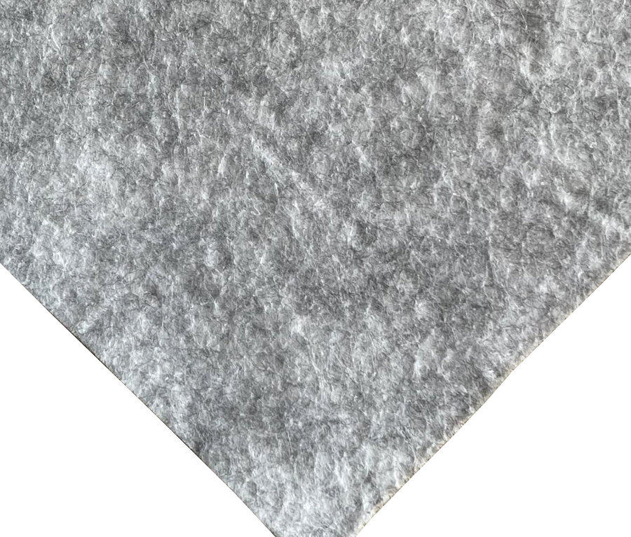 Detailaufnahme von grauem Filz.
