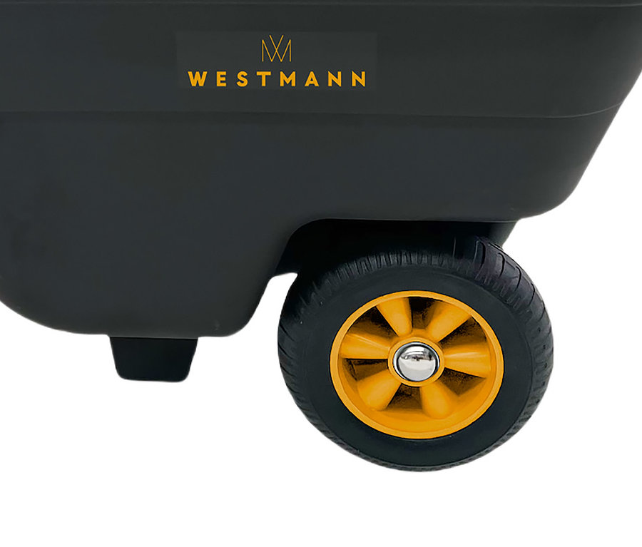 Detailaufnahme eines schwarzen Westmann-Wagens mit gelben Rädern.