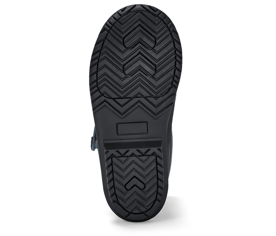 Sohle eines schwarzen Stiefels mit geometrischem Herzmuster.