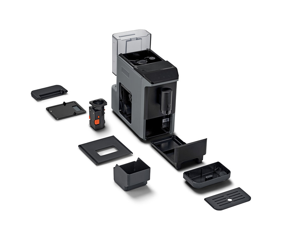 Ein zerlegter »Esperto mini« Kaffeevollautomat, Grey und seine Einzelteile auf weißem Hintergrund.