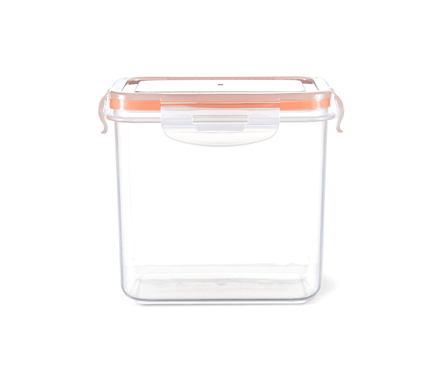 Eine durchsichtige Frischhaltedose mit orangefarbenem Deckel.