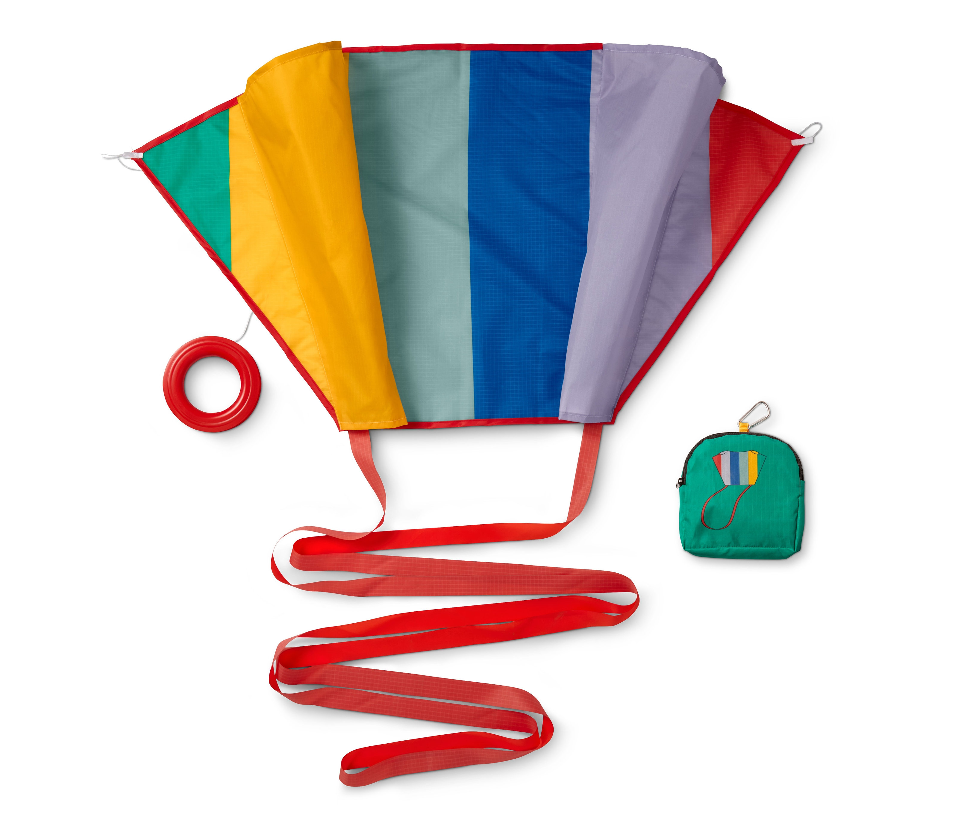Ein aufgefalteter Taschendrachen mit bunten Streifen, einer roten Schnur und einer grünen Tasche.