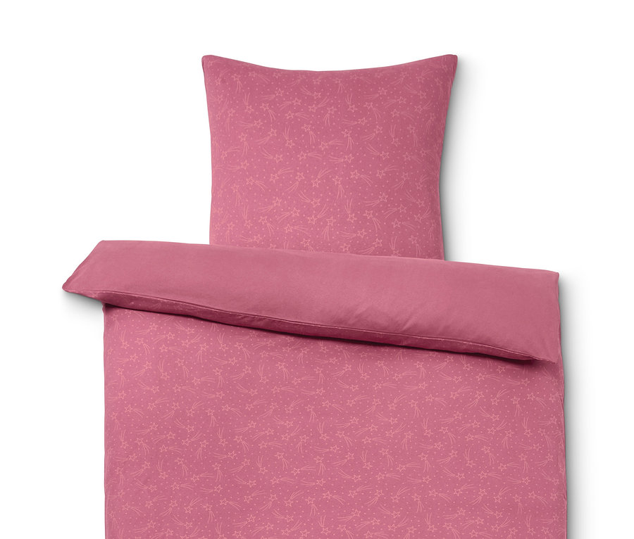 Rosa Winterjersey-Bettwäsche mit Sternenmuster.