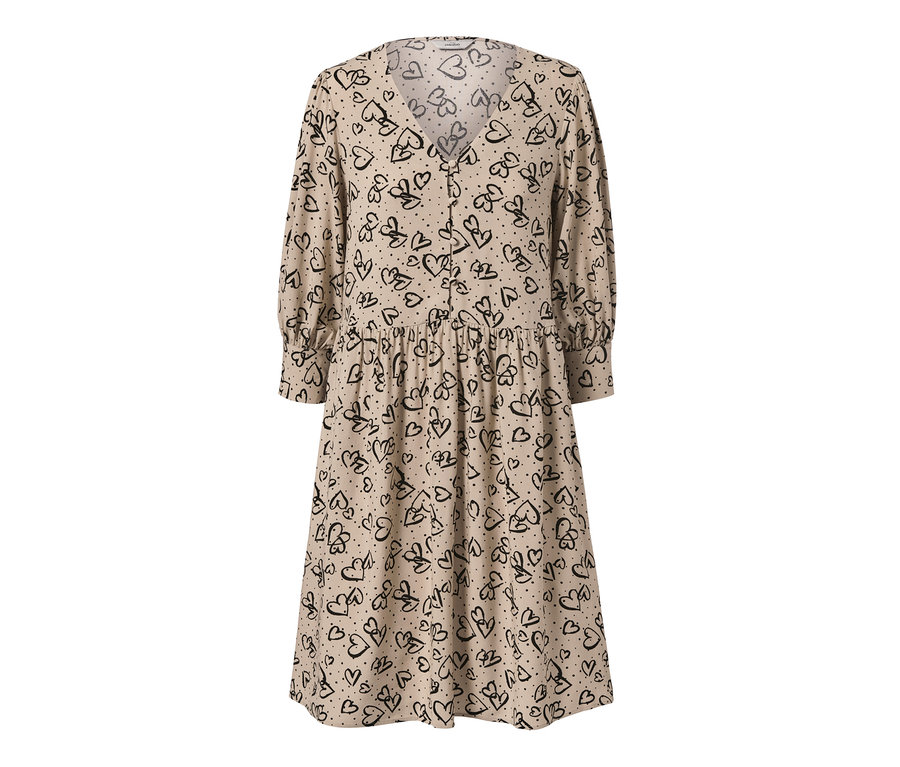 Beiges Kleid mit schwarzem Herzprint.