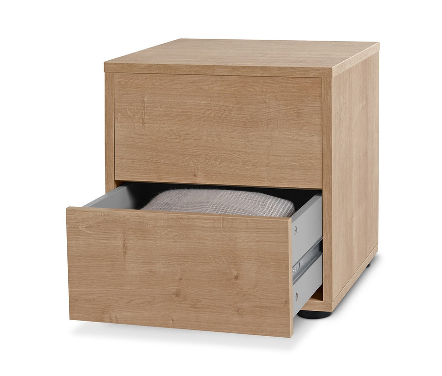 Ein Regalmodul »Flemming« mit zwei Schubladen im Eichendekor, wobei eine Schublade geöffnet ist.