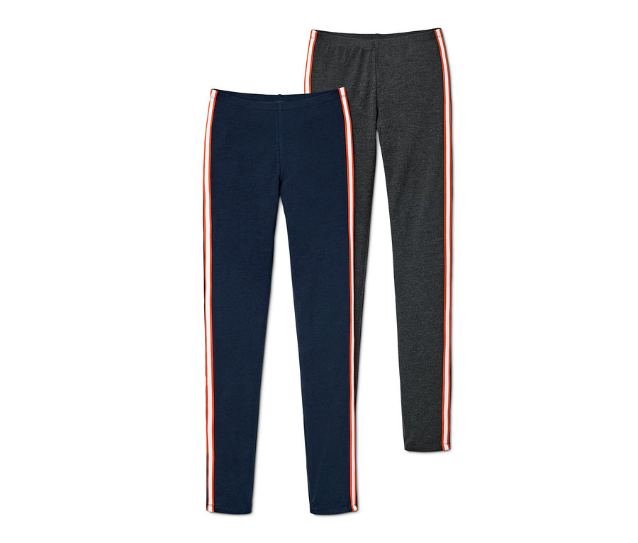 Zwei Leggings, eine marineblau, eine anthrazit, beide mit rot-weißem Seitenstreifen.