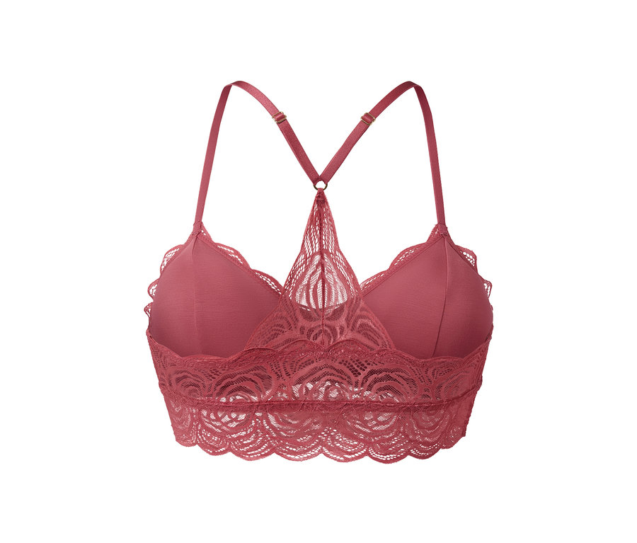 Detailansicht eines rosafarbenen Spitzen-Bustiers.