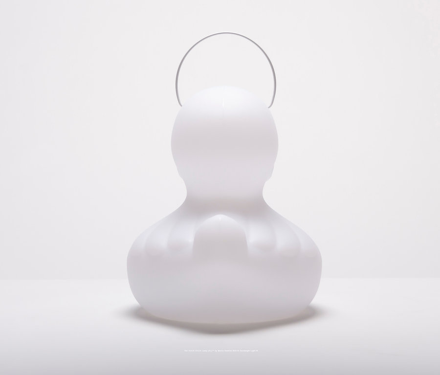 Weiße Goodnight Light LED-Leuchte »Ente« S in Form einer Ente mit Drahtgriff.