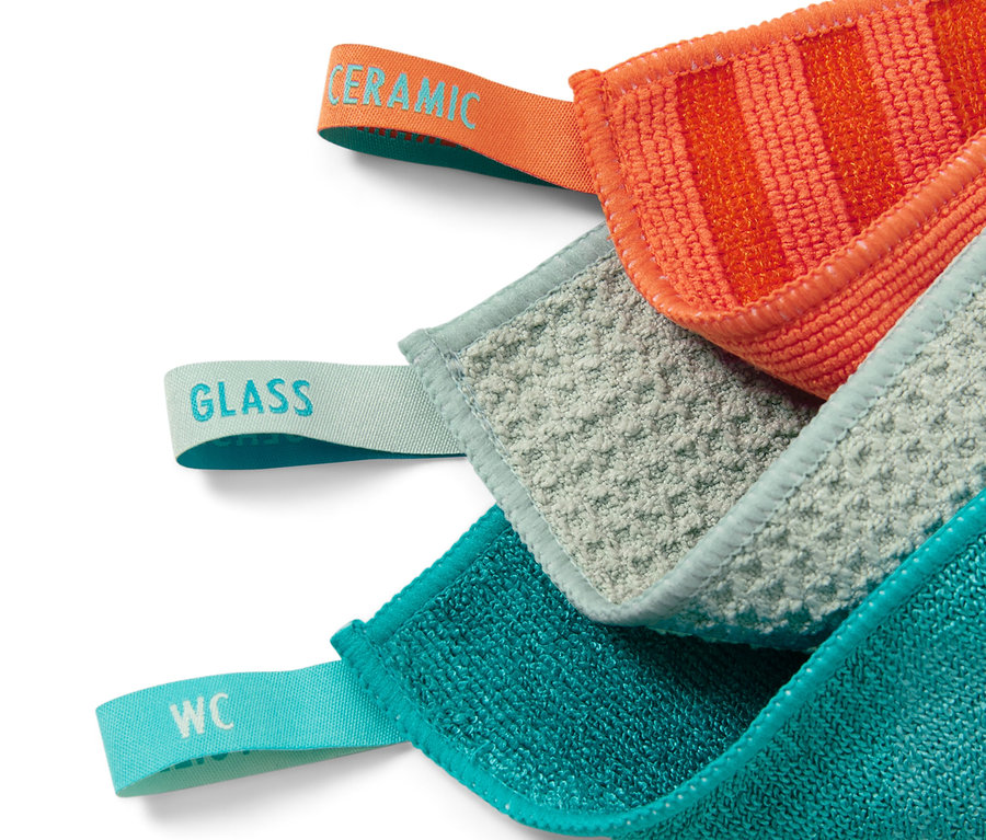 Reinigungstuch-Set: Orange für Keramik, Grau für Glas und Türkis für WC.
