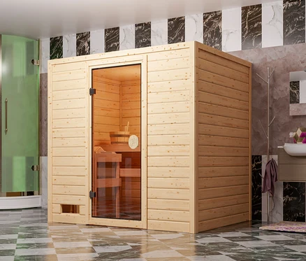 Badezimmerinterieur mit Holzsauna, Duschkabine und Waschbecken.