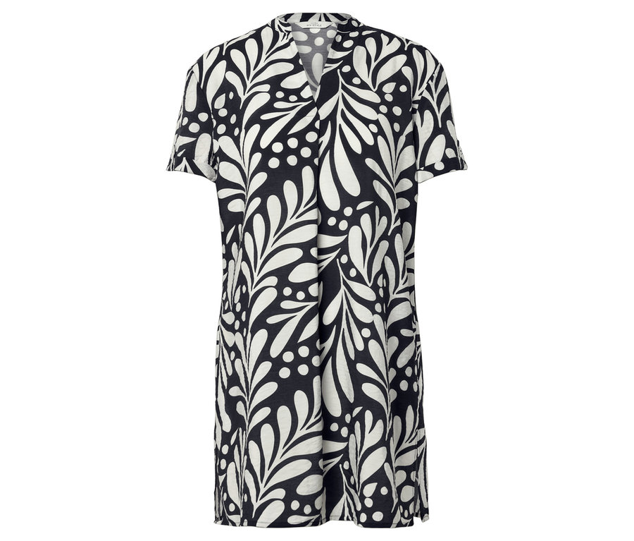 Ein schwarzes Kleid mit weißen Blättern und Punkten.