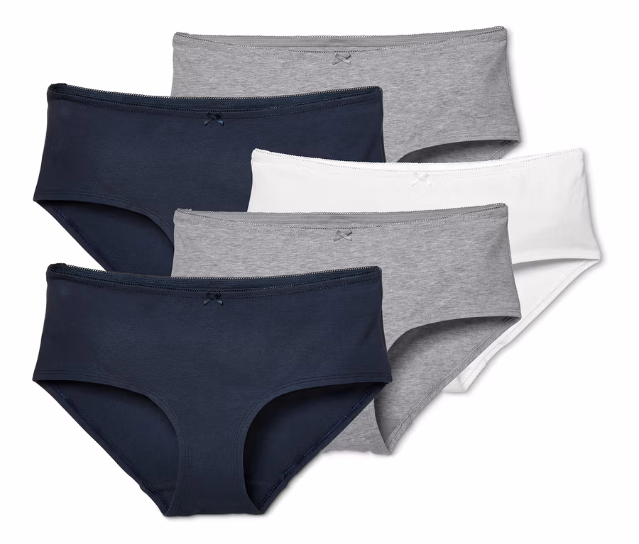 Fünf Pantys in Dunkelblau, Grau und Weiß.