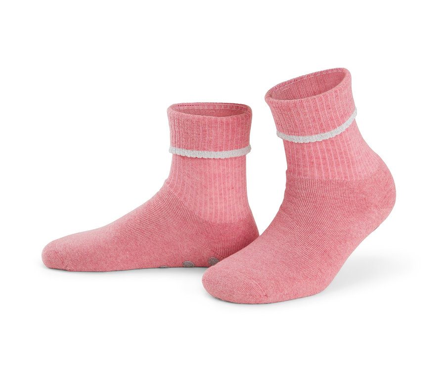 Zwei Paar rosa Stoppersocken.