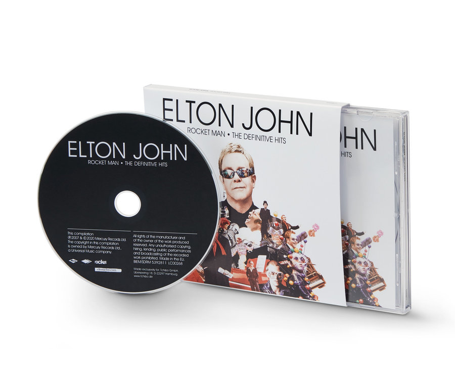 Eine schwarze CD von Elton John – »Rocket Man: The Definitive Hits« neben der Albumhülle.