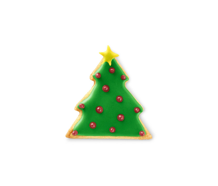 Verzierter Lebkuchen in Form eines Weihnachtsbaums mit XL-Keksausstecher.