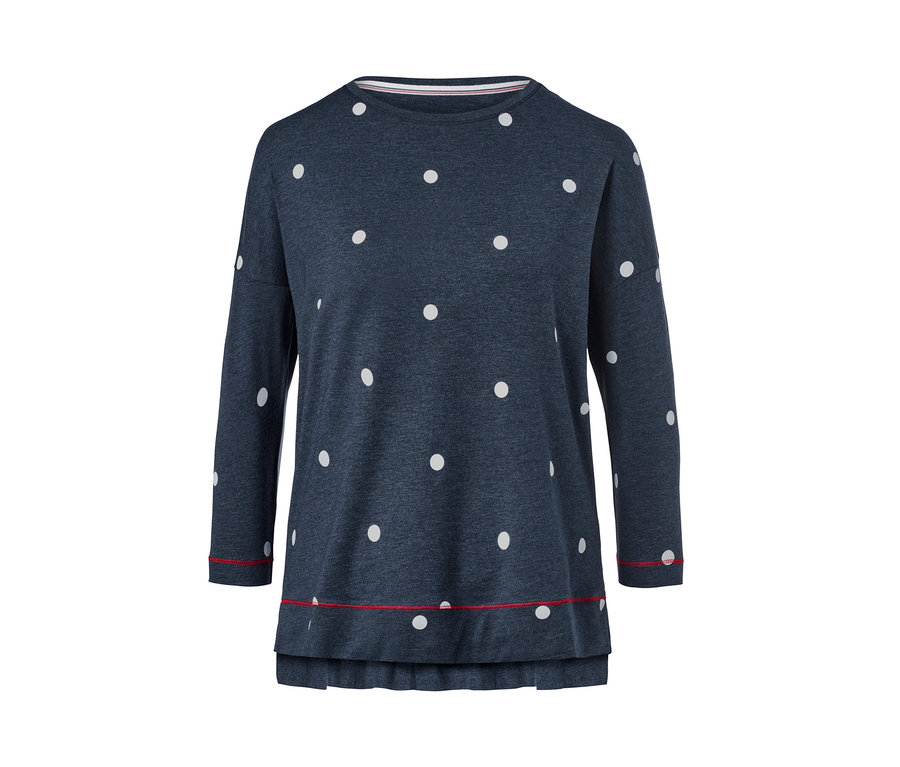 Marineblauer Pyjama mit weißen Punkten.