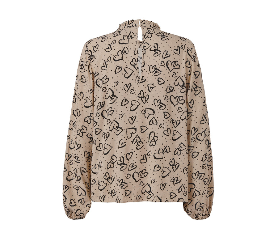 Beige Bluse mit schwarzem Herzprint.