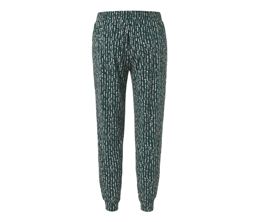 Abgebildet ist eine Relaxhose mit einem dunkelgrünen Hintergrund und einem weißen Muster.