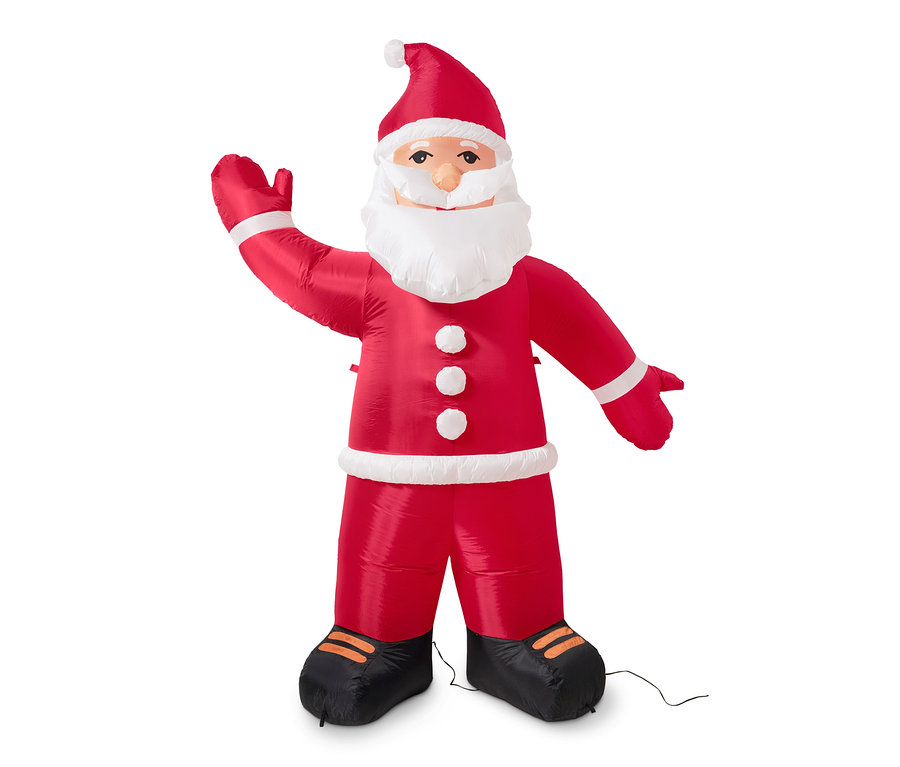 Ein aufblasbarer XXL-LED-Weihnachtsmann steht und winkt.