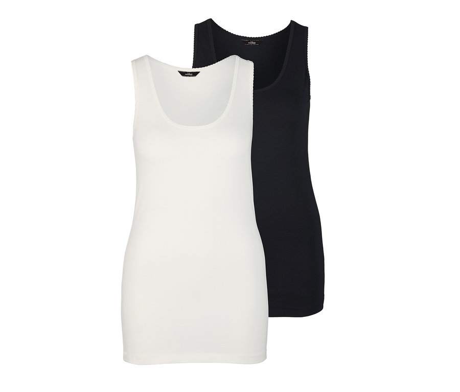 Zwei Tops: ein weißes und ein schwarzes.