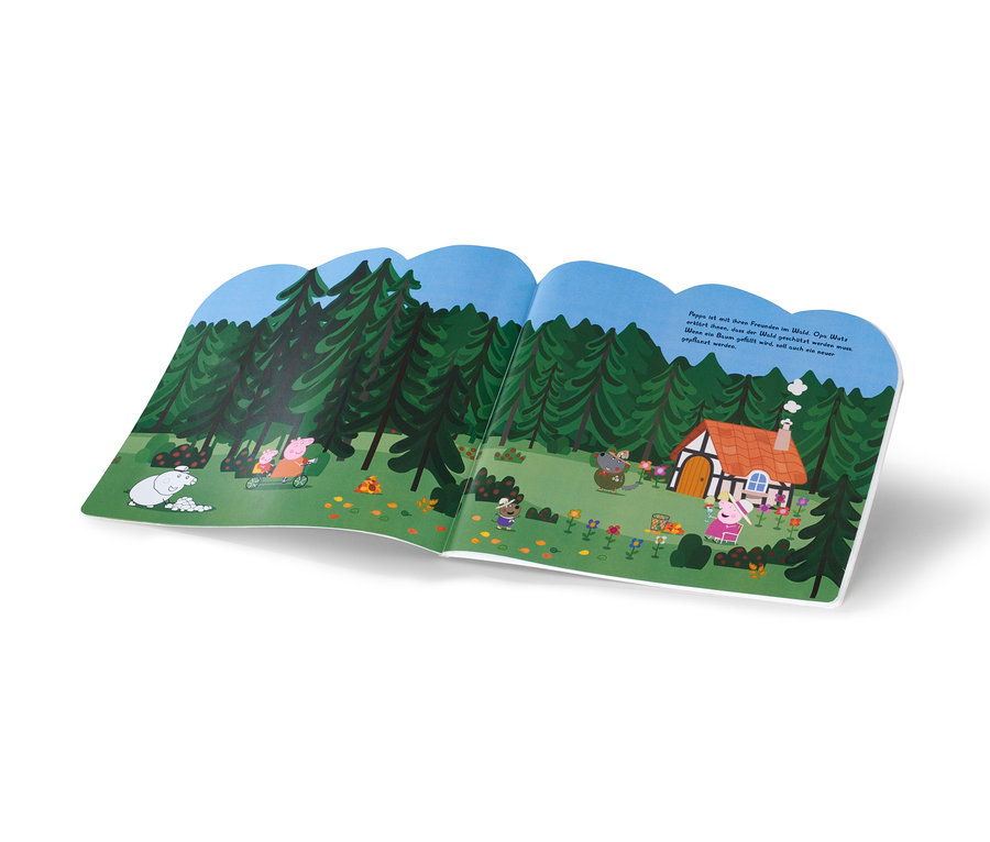 Aufgeschlagenes Buch mit einer Illustration von Peppa Pig und ihren Freunden im Wald.