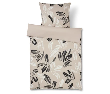 Bettwäsche mit Blumenmuster in Beige und Schwarz und passender Kissenbezug.