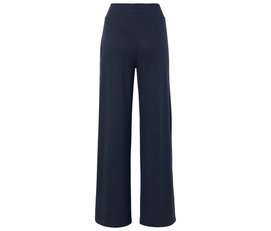Dunkelblaue, weit geschnittene Hose von hinten gezeigt.