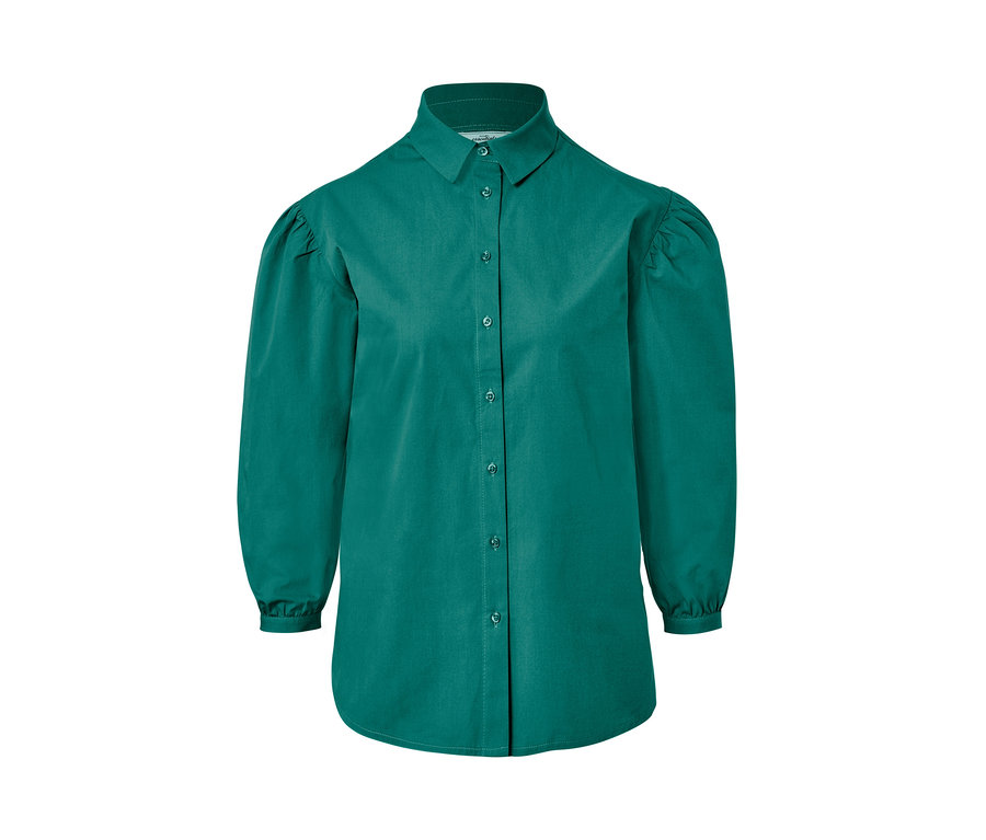 Grüne Hemdbluse mit Puffärmeln.