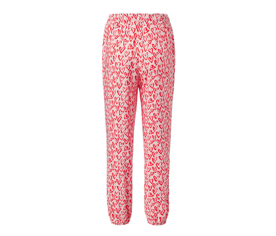 Rosa Relaxhose mit roten Herzen.