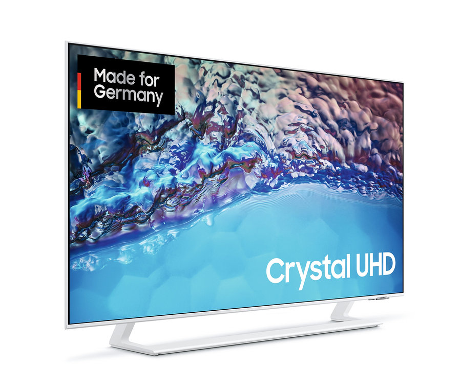 Ein weißer Samsung Crystal UHD 4K LED-Fernseher »GUBU8589UXZG« steht auf einem weißen Sockel.