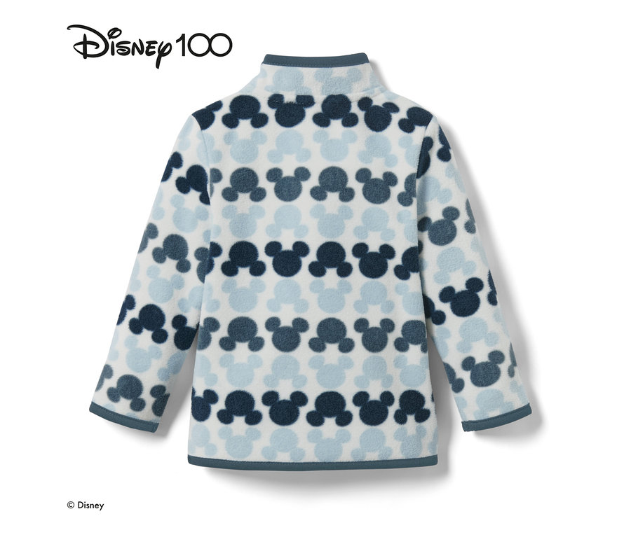 Detail einer blau gemusterten Kleinkind-Fleecejacke »Micky« mit Mickey Mouse-Motiv.