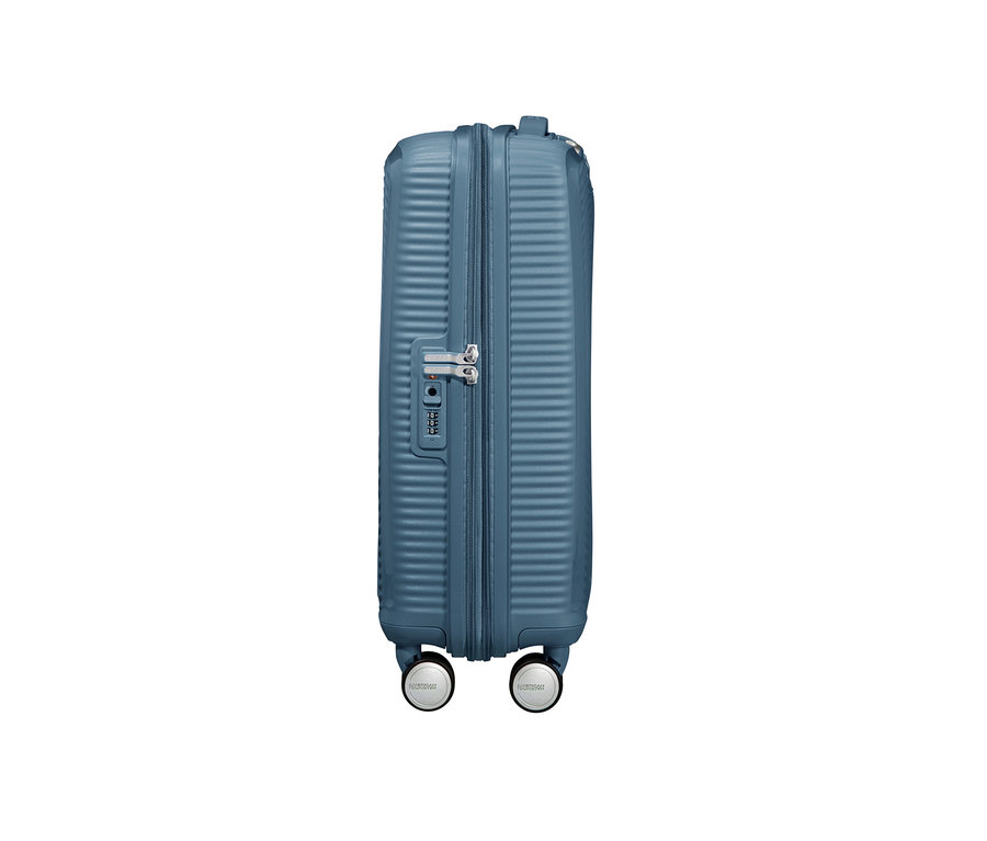 Detailansicht eines kleinen, steinfarbenen American Tourister Hartschalen-Koffers »Soundbox« Spinner mit Zahlenschloss.