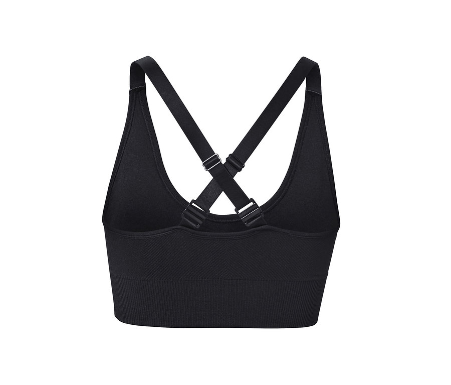 Detailansicht eines schwarzen Seamless-Sport-Bustiers mit gekreuzten Trägern.