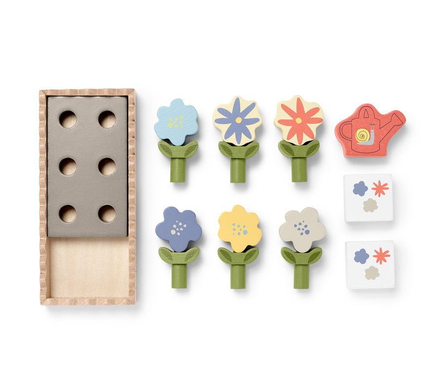 Holz-Steckblumenbeet mit verschiedenfarbigen Blumen und einer Gießkanne.