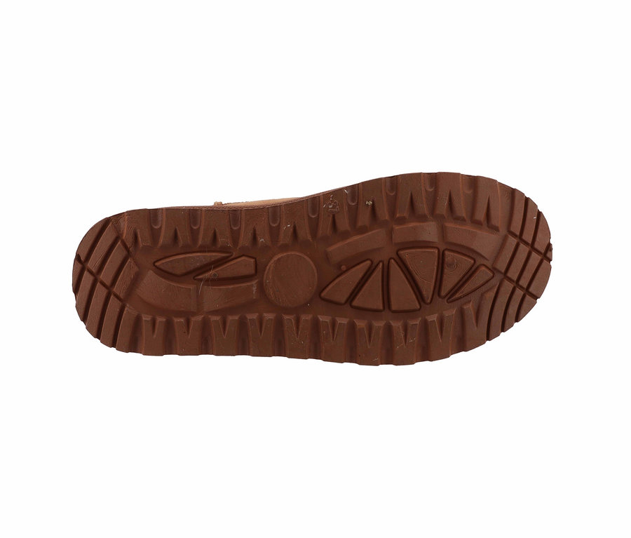 Braune Schuhsohle mit geometrischem Muster.