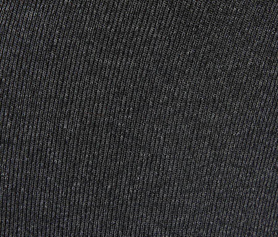 Detailaufnahme eines grauen Strickstoffs.