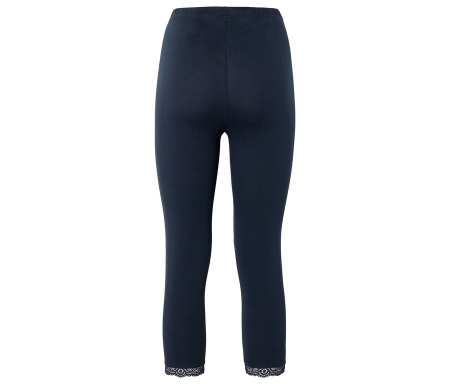 Dunkelblaue Leggings mit Spitzenbesatz am Beinabschluss.