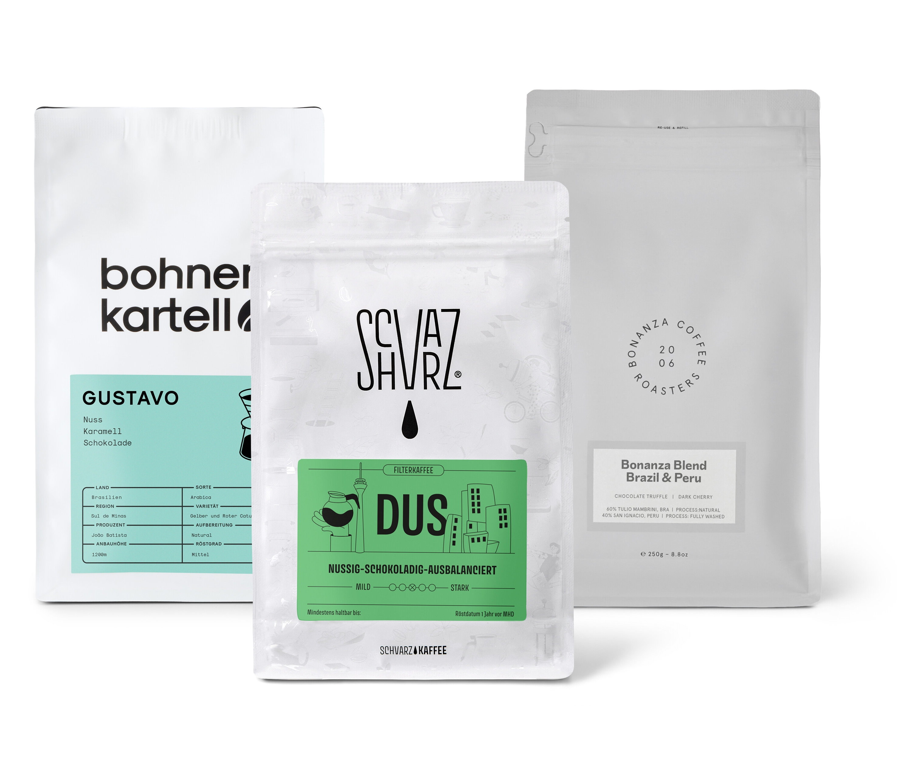 Drei Packungen Filterkaffee Probierset "Dreierpack schokoladig" mit ganzen Bohnen stehen auf einer weißen Oberfläche.