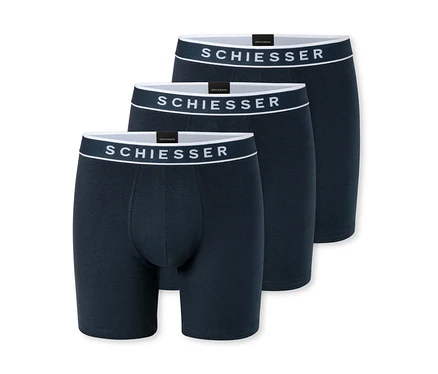 Drei dunkelblaue Boxershorts mit weißen Bundbändern, jeweils mit dem „SCHIESSER“-Logo, sind auf einem weißen Hintergrund gestapelt und leicht überlappend.