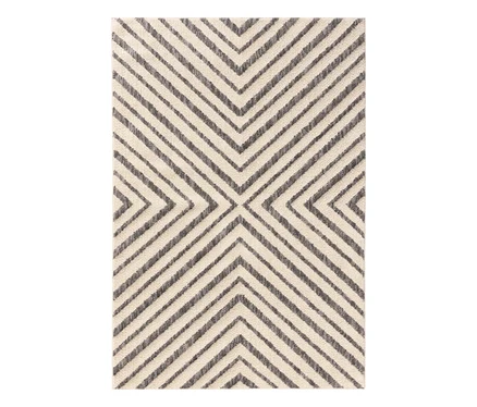 Rechteckiger benuta Teppich #Junis Chevron# mit cremefarbenem Hintergrund und dunkelgrauen Chevron-Streifen, die ein X-Muster bilden.