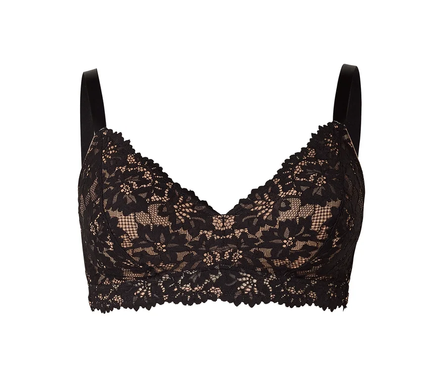 Ein schwarzer Spitzen-Bralette mit nudefarbenem Futter, floralem Muster und gewelltem Rand auf weißem Hintergrund.