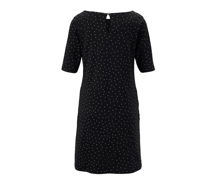 Ein Jerseykleid im Punkte-Dessin.