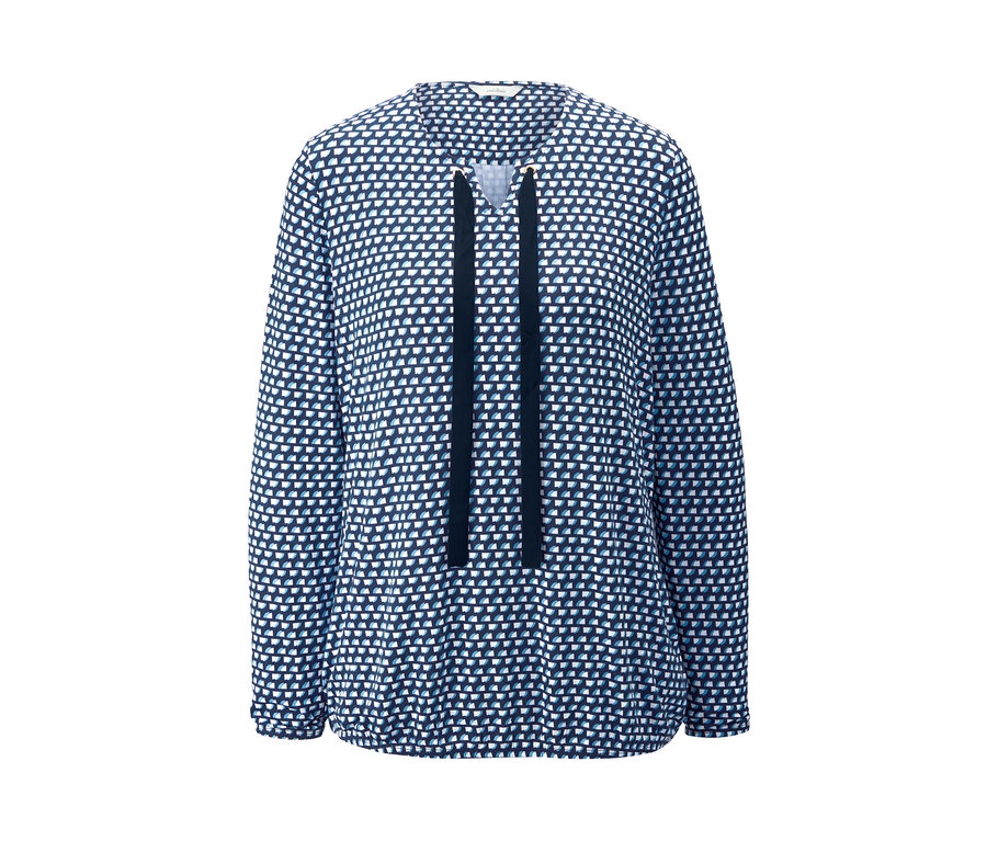 Blusenshirt mit geometrischem Muster und langen Ärmeln.