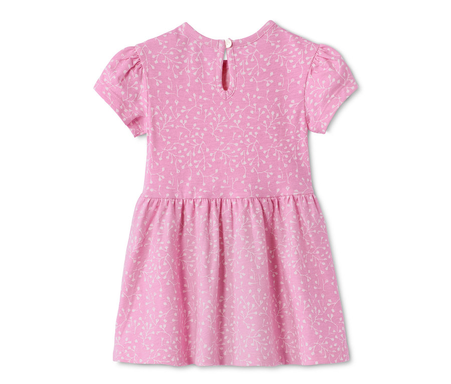 Detailansicht eines Baumwollkleides mit kurzen Ärmeln und Blättermuster.