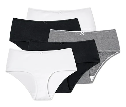 Fünf Pantys in verschiedenen Schnitten und Farben (weiß, schwarz und gestreift).