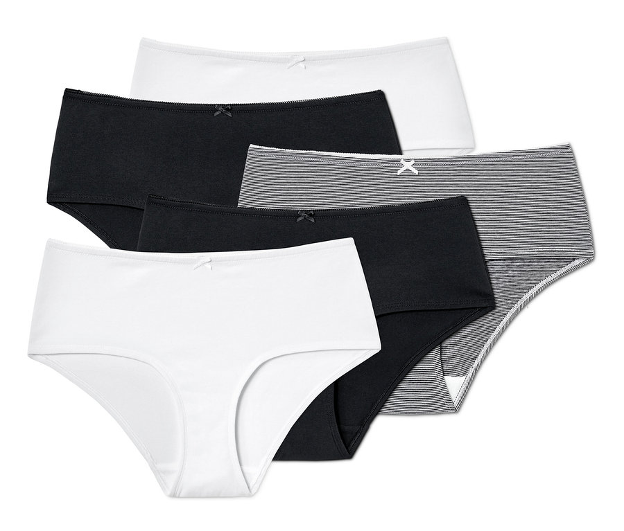 Fünf Pantys in verschiedenen Schnitten und Farben (weiß, schwarz und gestreift).